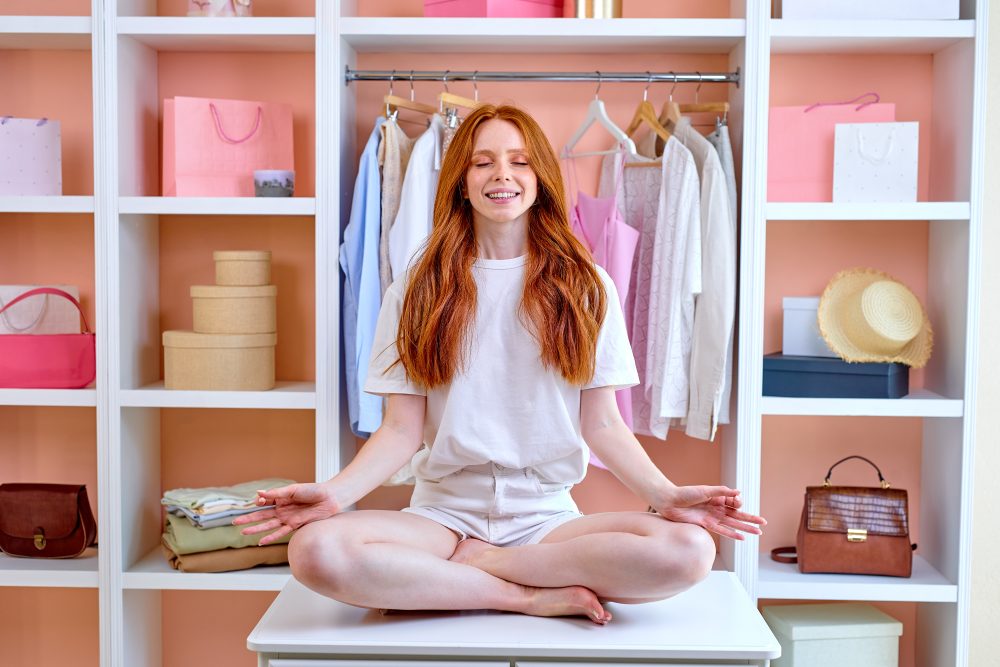 Woman with an organised wardrobe